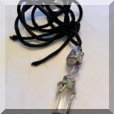 J183. Crystal pendant on string. - $20 